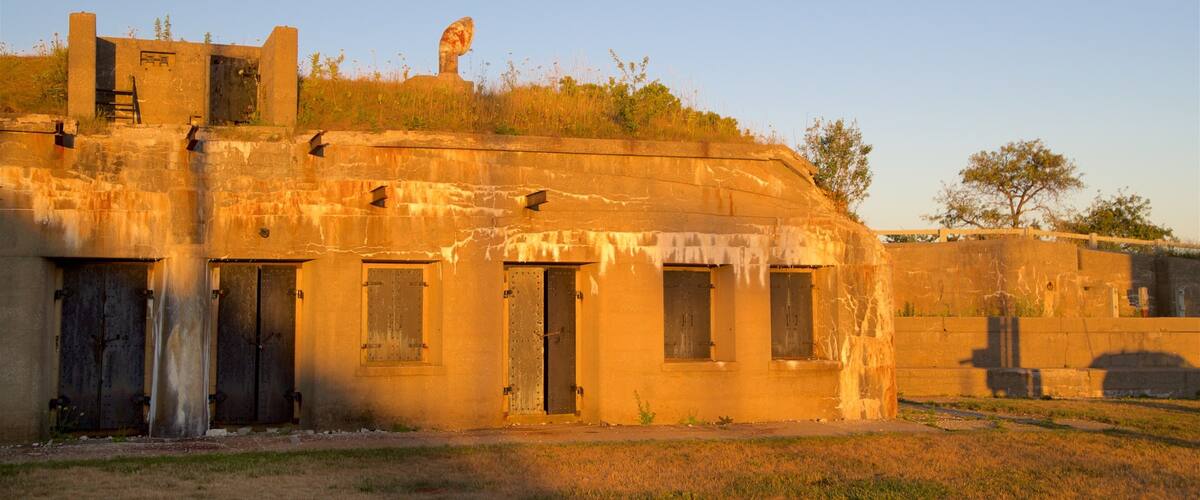 Fort Preble showing heritage architecture and a sunset