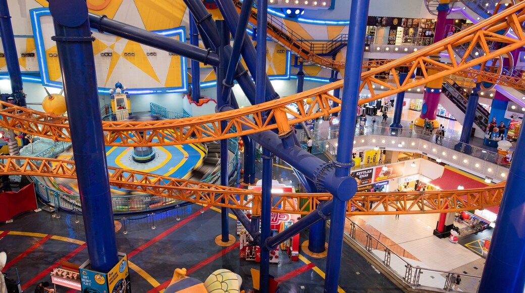 Berjaya Times Square which includes shopping, interior views and rides