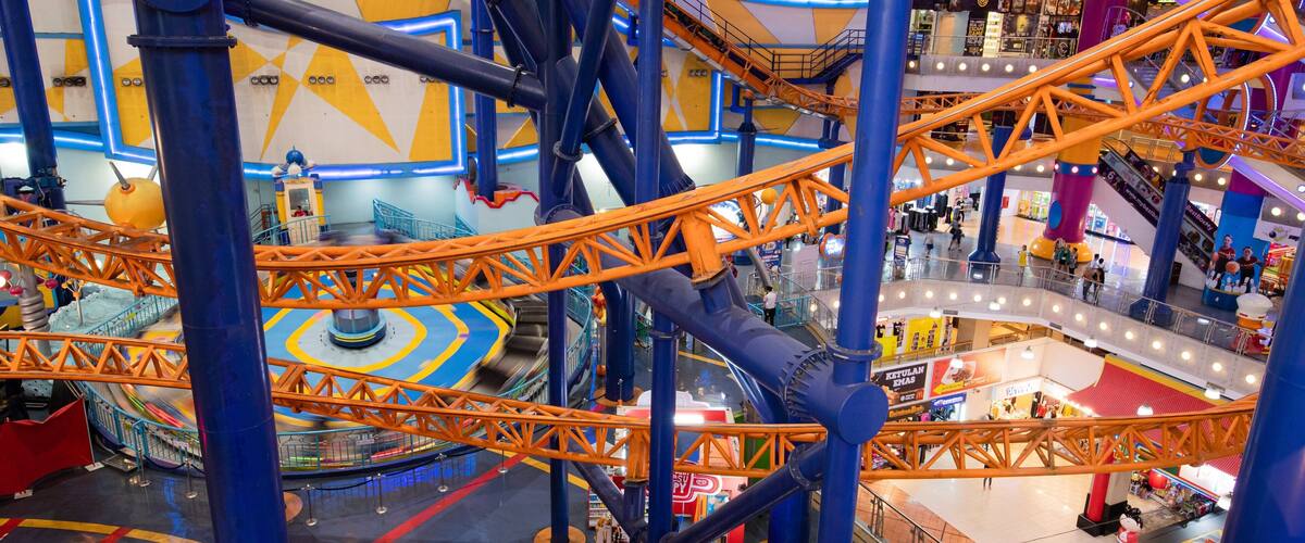 Berjaya Times Square which includes shopping, interior views and rides