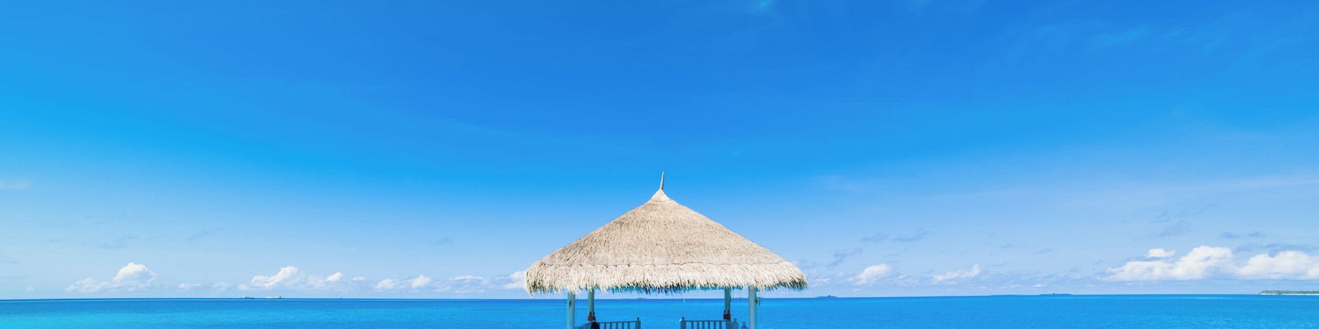 Paradise beach. Holiday vacations tourism concept. Tropical resort jetty in Maldives