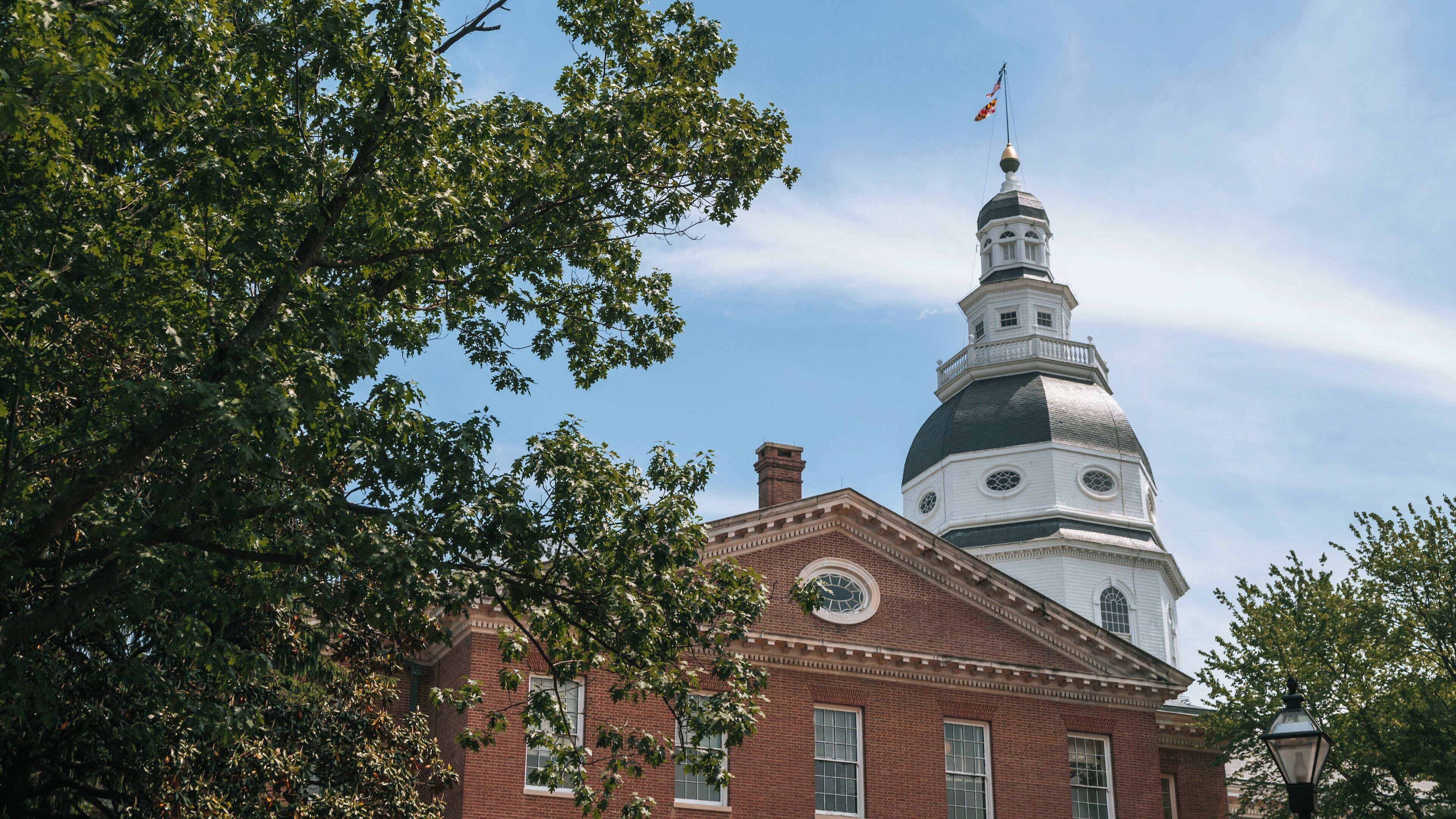 Maryland State House stands tall in Historic District of Annapolis, showcasing its iconic architecture on a sunny day
