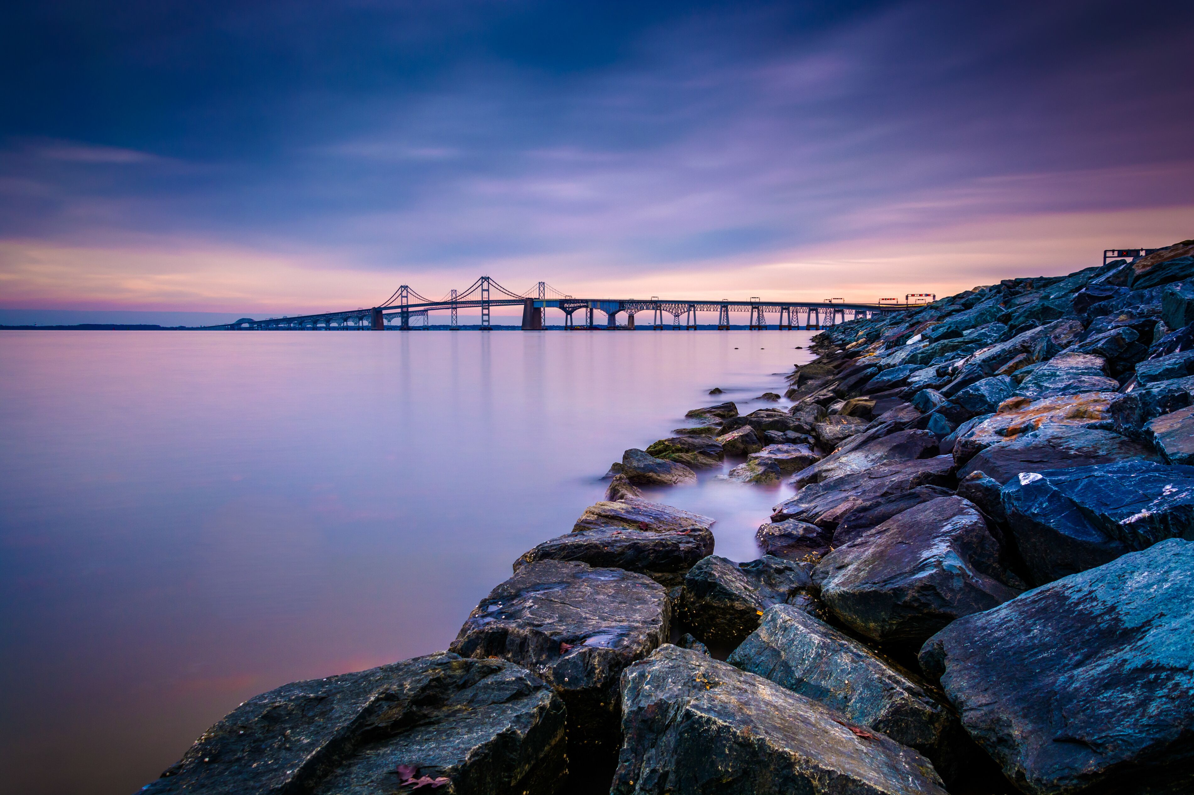 Long exposure of a jetty and the Chesapeake Bay Bridge, from San