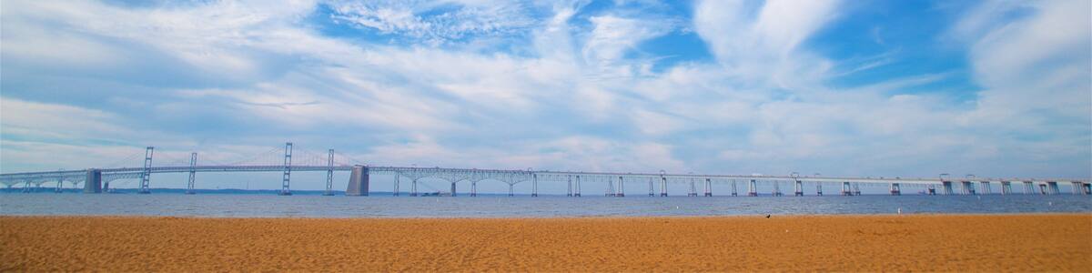 Chesapeake Bay Bridge which includes a bridge, landscape views and a sandy beach