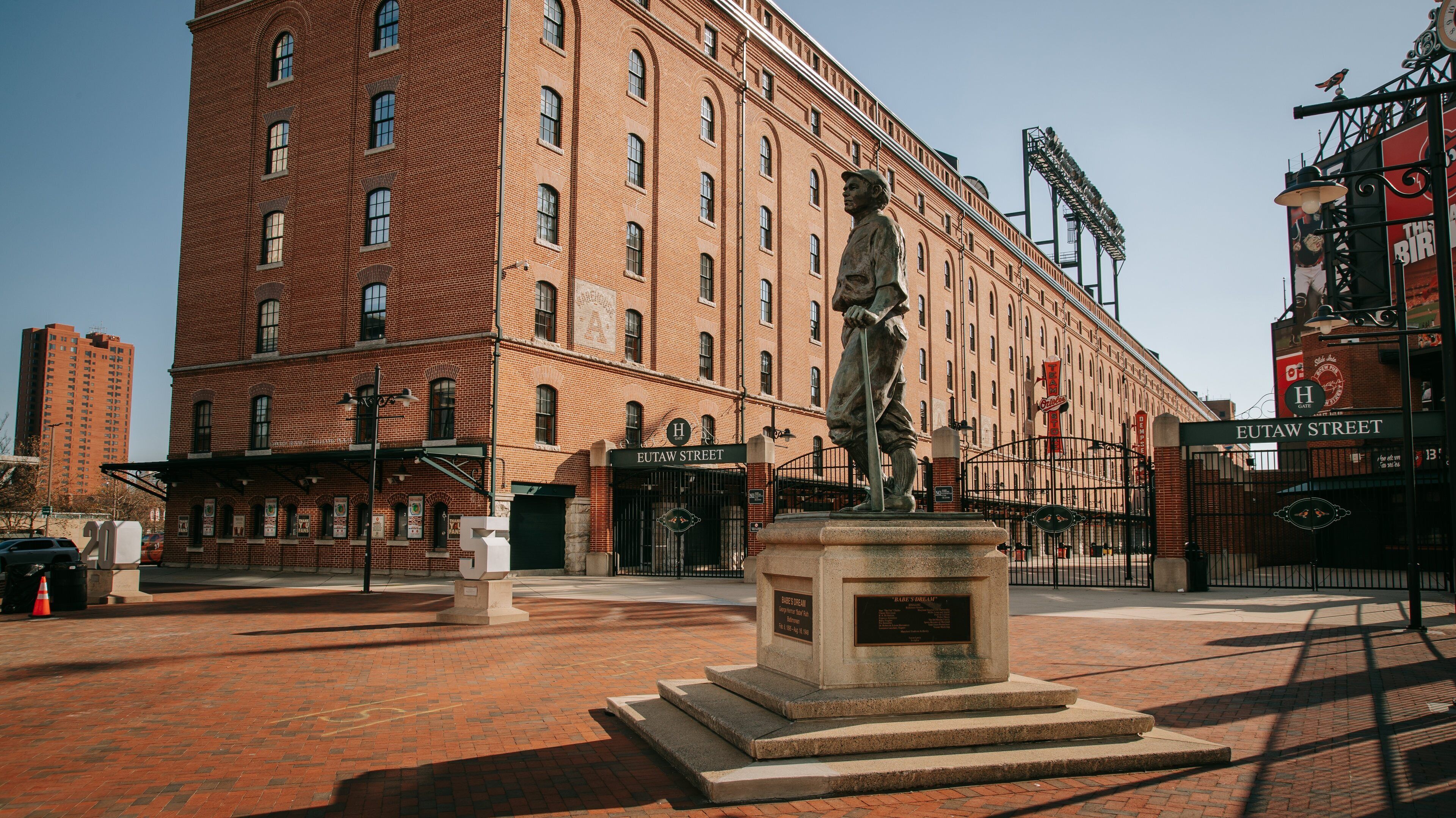 Oriole Park at Camden Yards which includes a city and a statue or sculpture