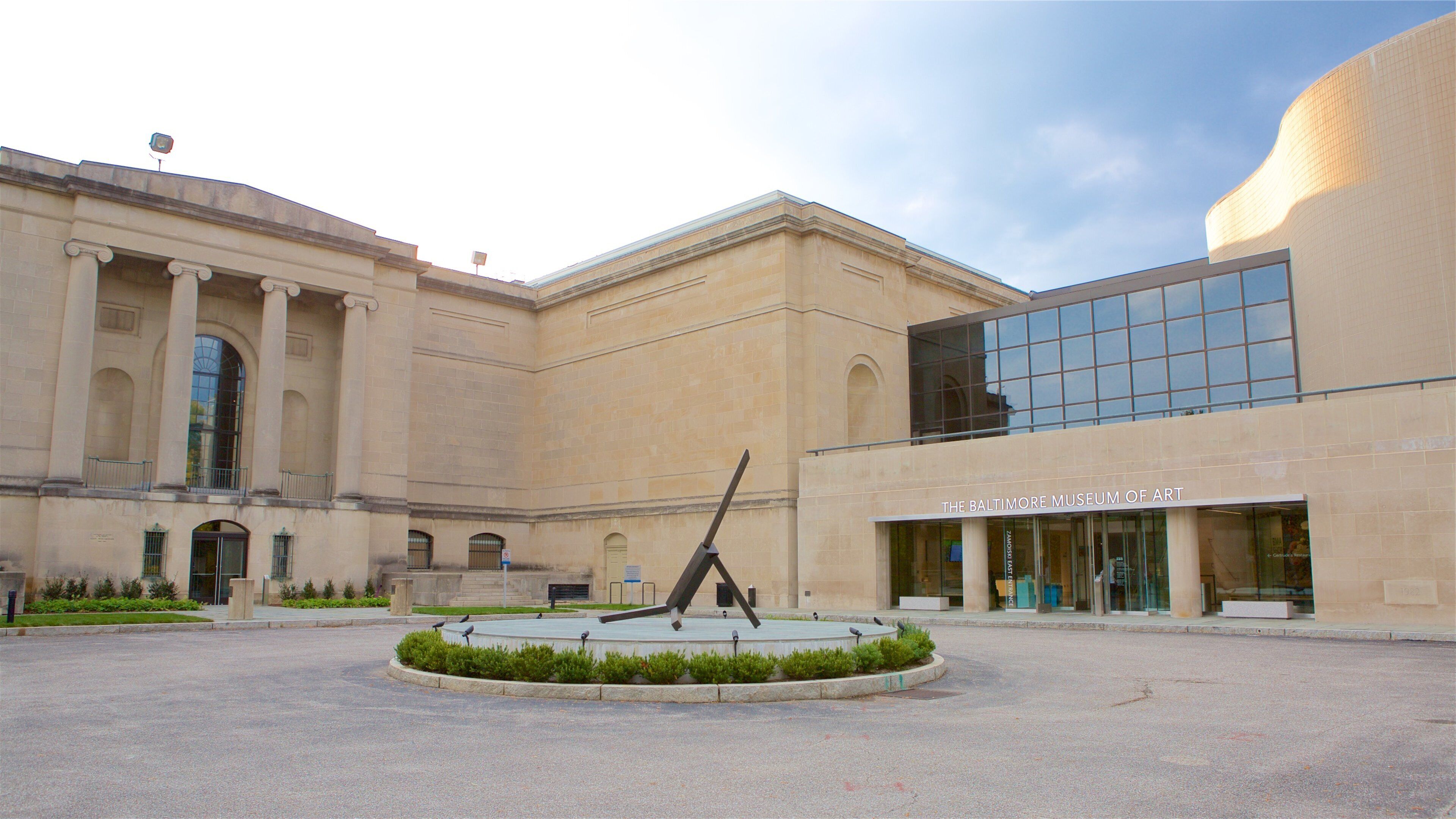 The Baltimore Museum of Art with classical architecture and a modern glass extension.