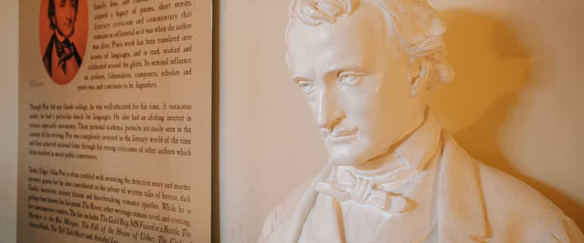 Edgar Allan Poe Museum and House showing a statue or sculpture