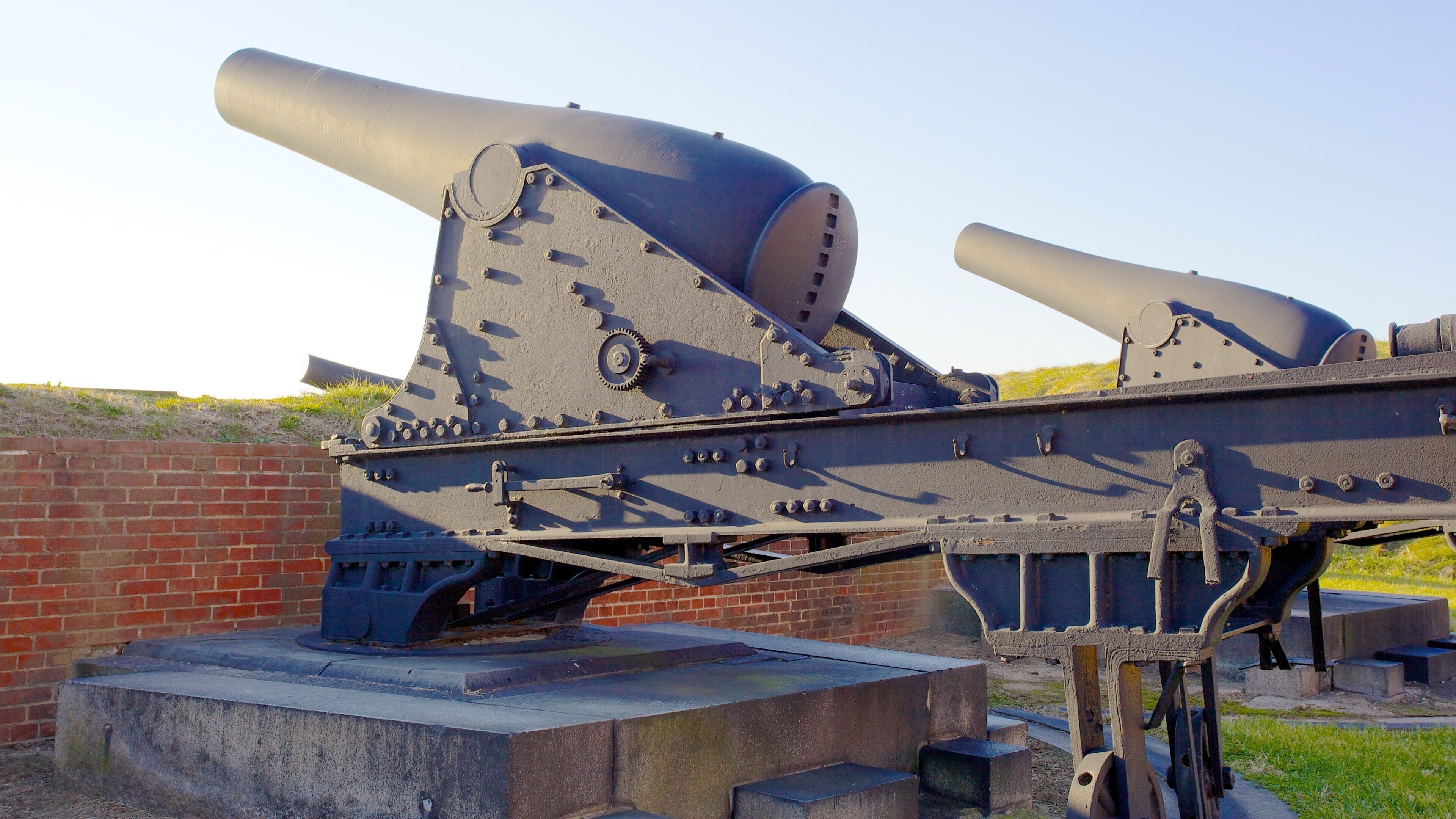 Historic cannons at Fort McHenry in Baltimore, Maryland during sunset