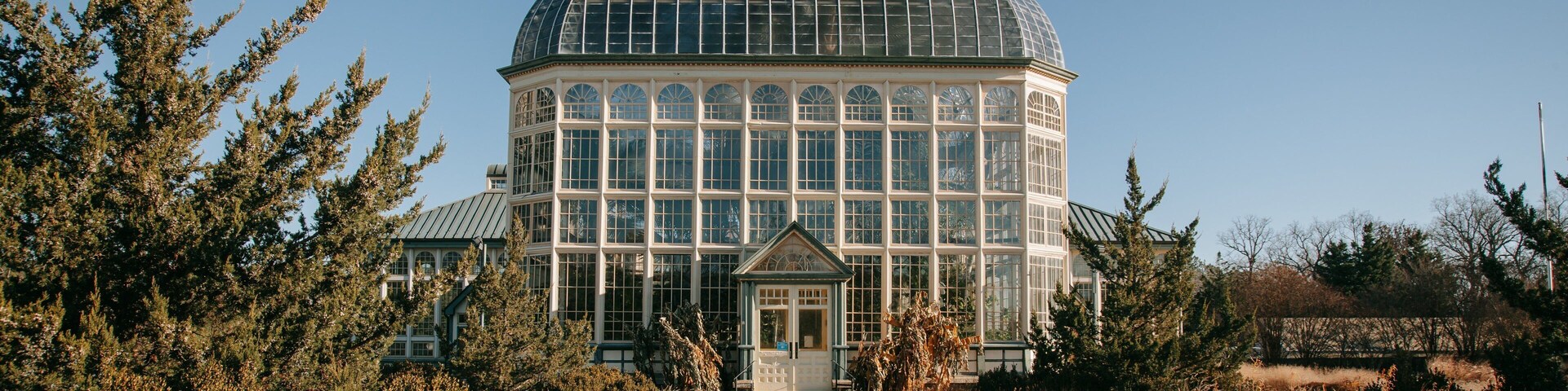 Baltimore Conservatory which includes a park and fall colors