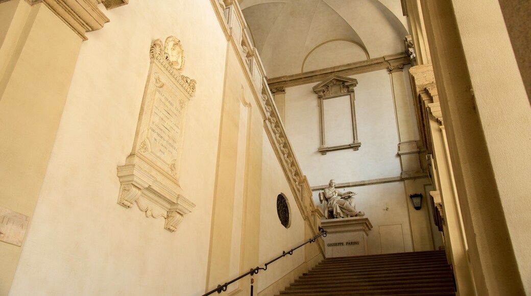 Pinacoteca di Brera featuring a statue or sculpture, interior views and heritage architecture