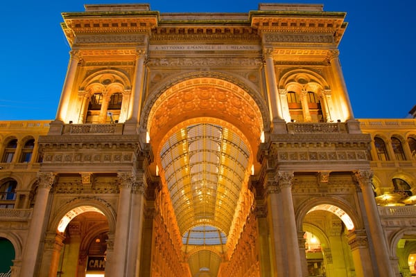 Galleria Vittorio Emanuele II which includes a castle, heritage architecture and night scenes