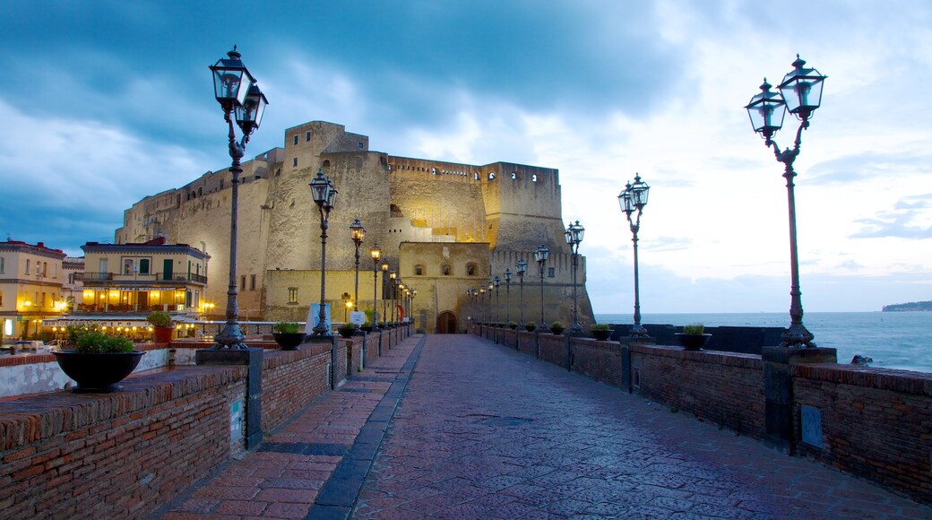 Castel dell\'Ovo featuring general coastal views, chateau or palace and heritage elements
