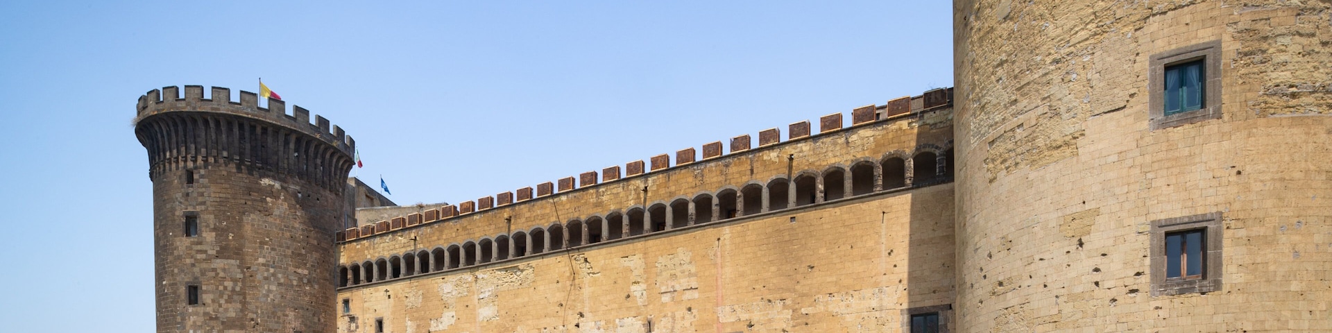 Castel Nuovo showing heritage architecture and chateau or palace
