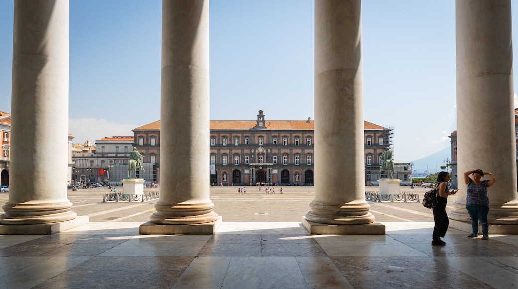 Royal Palace featuring a square or plaza and heritage elements as well as a couple
