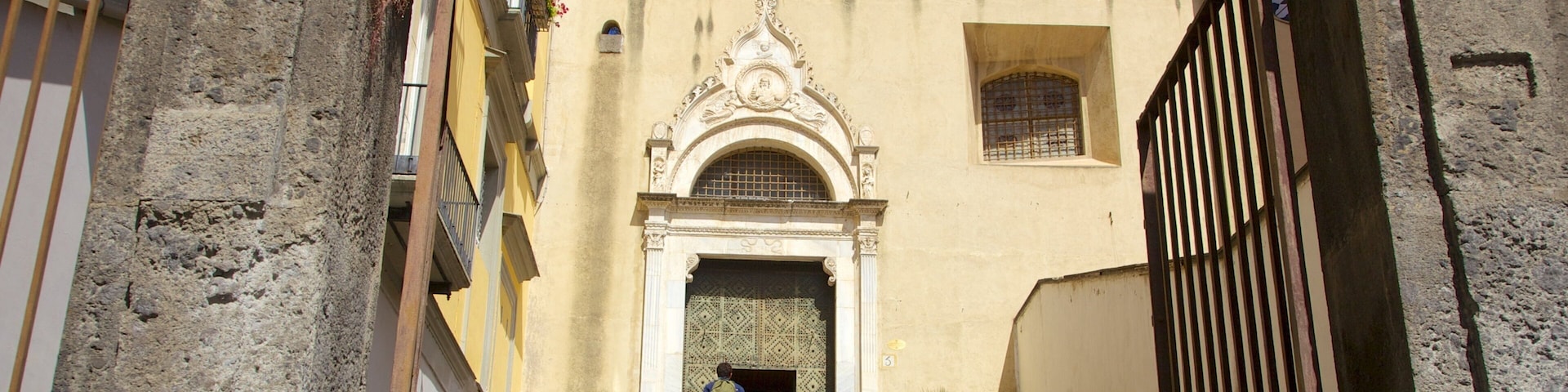 Naples which includes a church or cathedral and religious elements