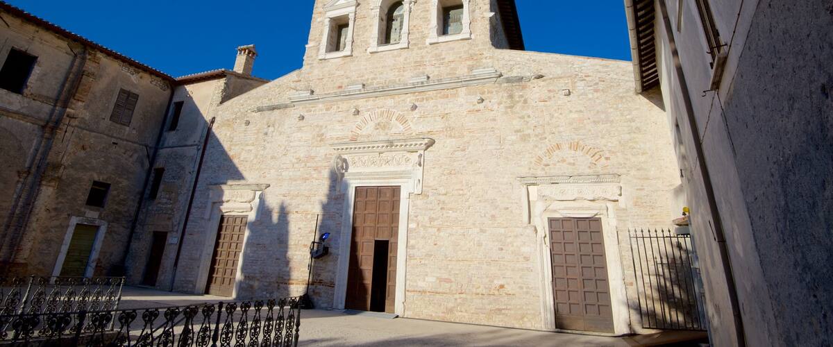Basilica of San Salvatore which includes a church or cathedral, religious elements and heritage architecture