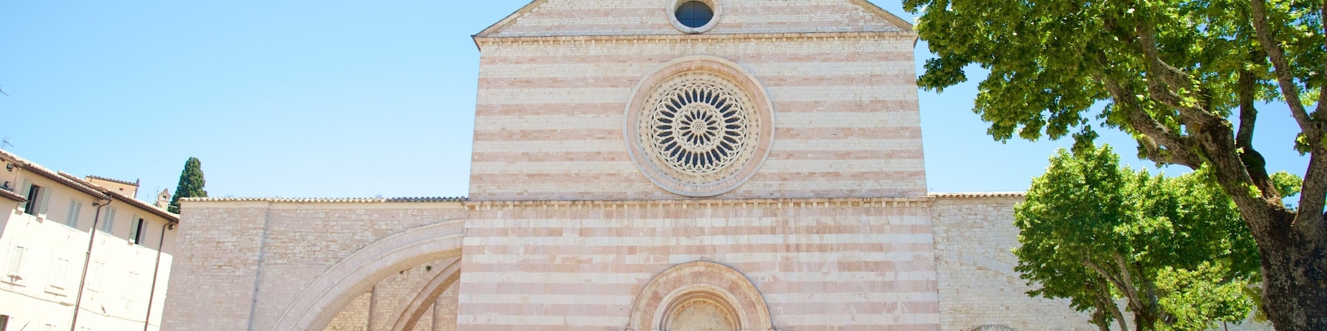 Basilica of Santa Chiara which includes heritage architecture and a church or cathedral as well as a large group of people