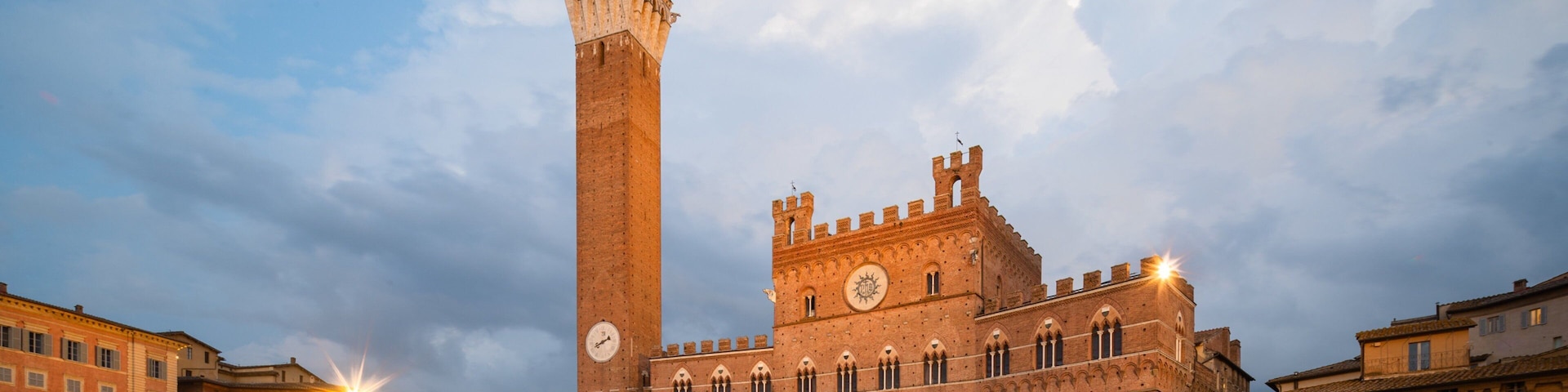 Palazzo Pubblico featuring a city, heritage architecture and night scenes