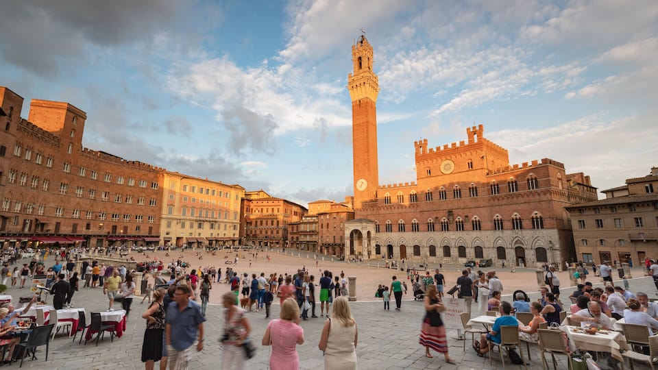 Palazzo Pubblico which includes street scenes, a city and a square or plaza