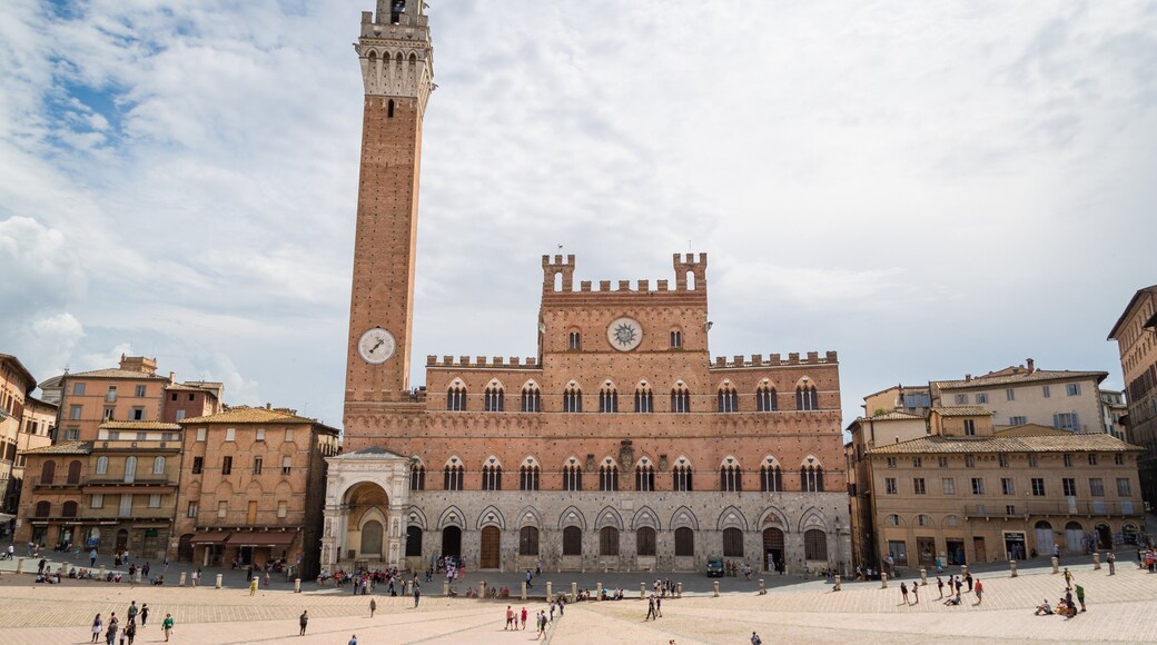 Piazza del Campo which includes a square or plaza and heritage architecture