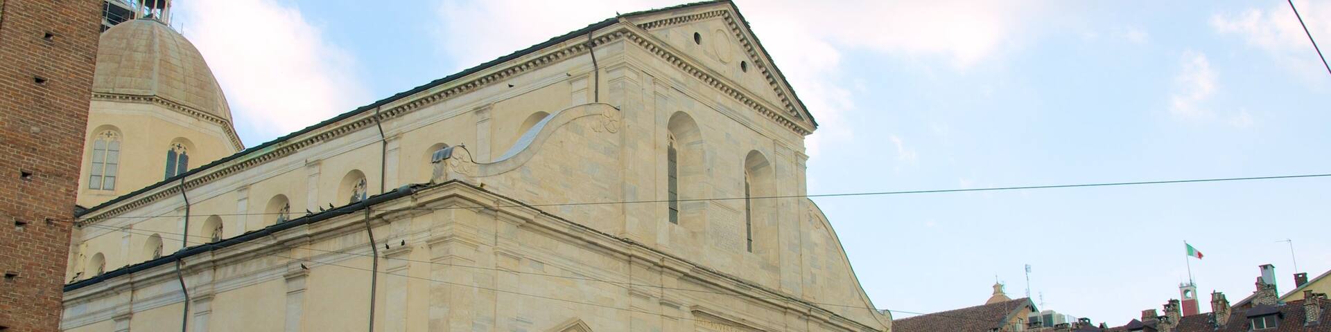 A historic building with a dome and arched windows.