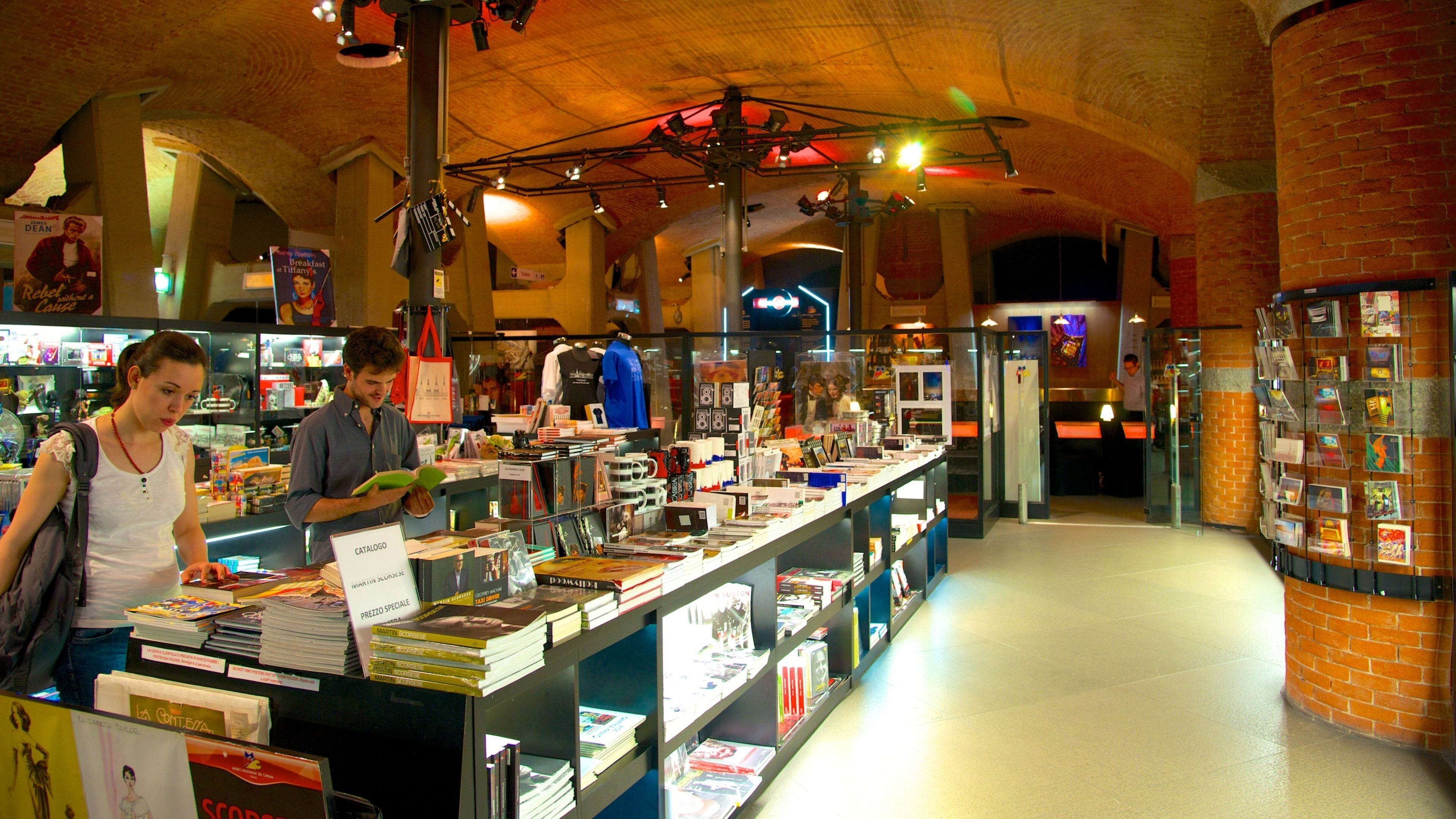 Mole Antonelliana which includes a city, shopping and interior views