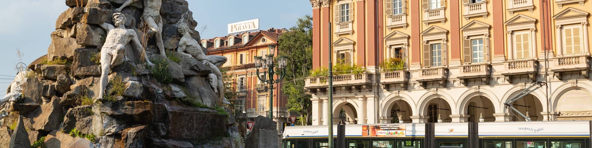 Piazza Statuto showing a fountain and outdoor art