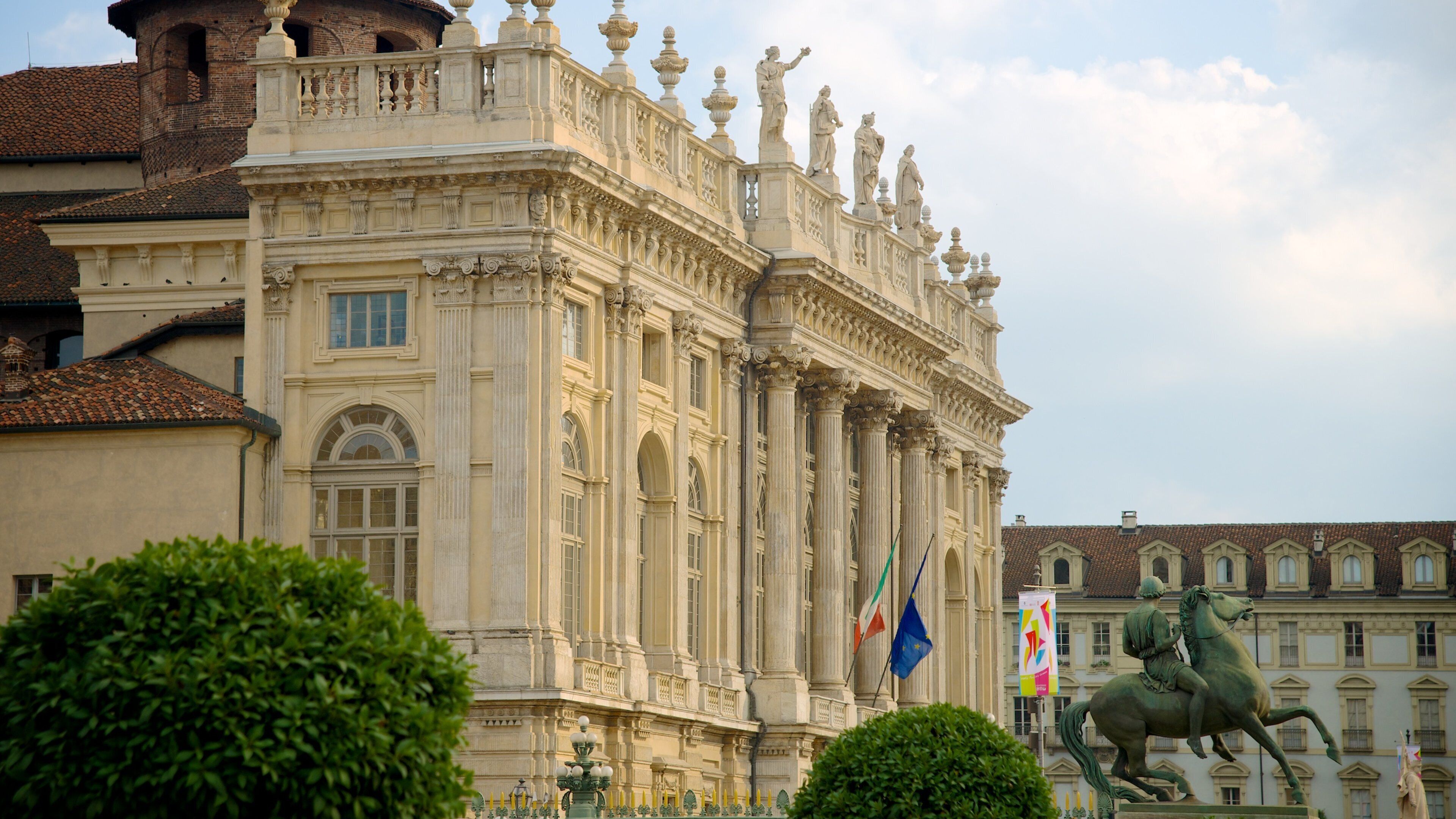 Turin Royal Palace featuring a castle, heritage architecture and a statue or sculpture