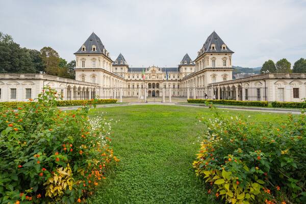 Valentino Castle which includes a garden, heritage architecture and wildflowers