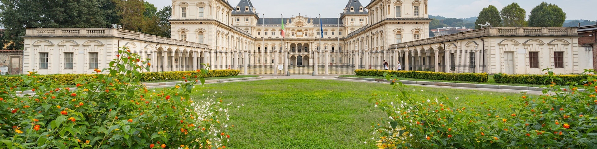 Valentino Castle which includes a garden, heritage architecture and wildflowers