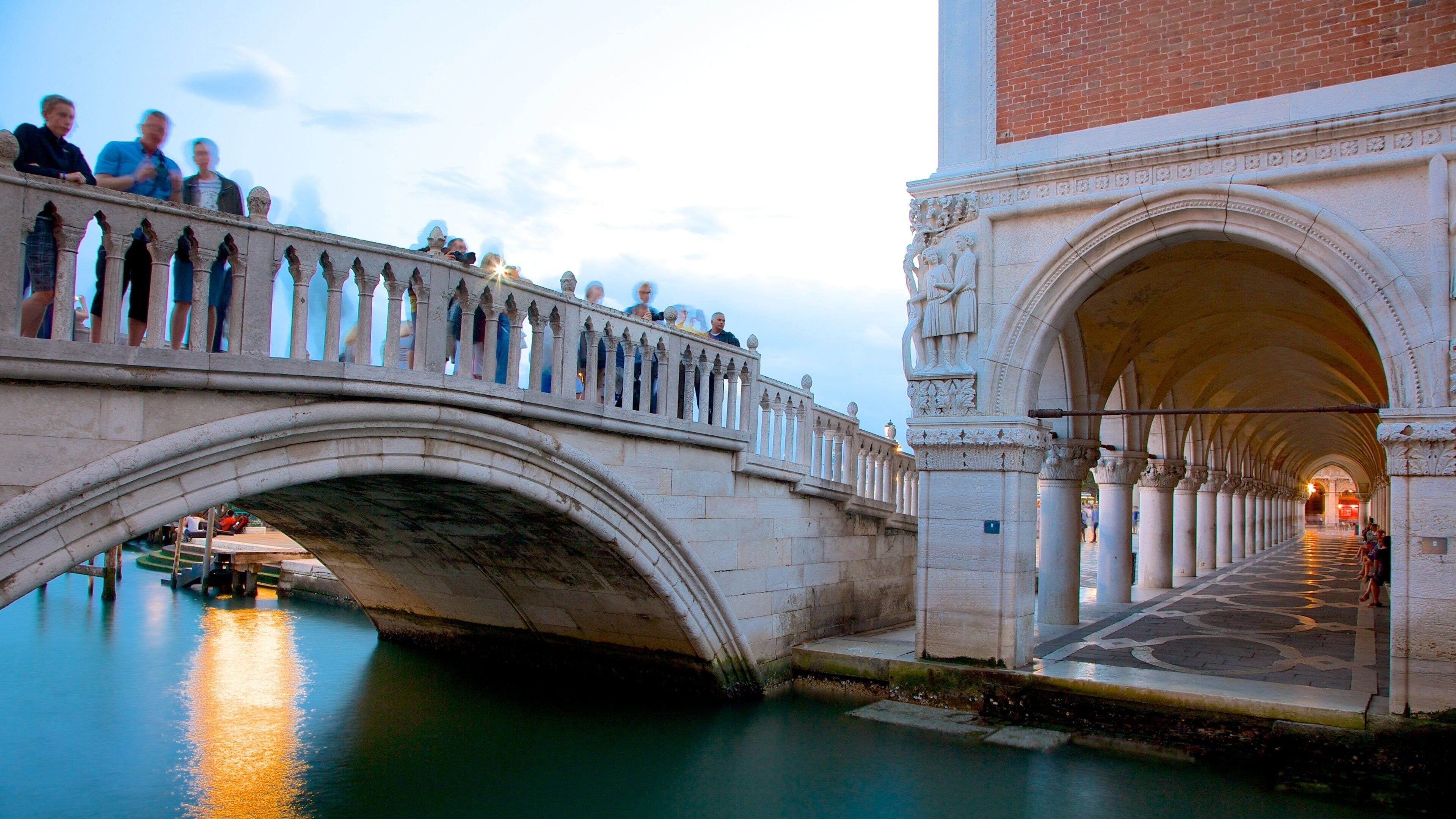 Bridge of Sighs showing heritage architecture, a sunset and a river or creek