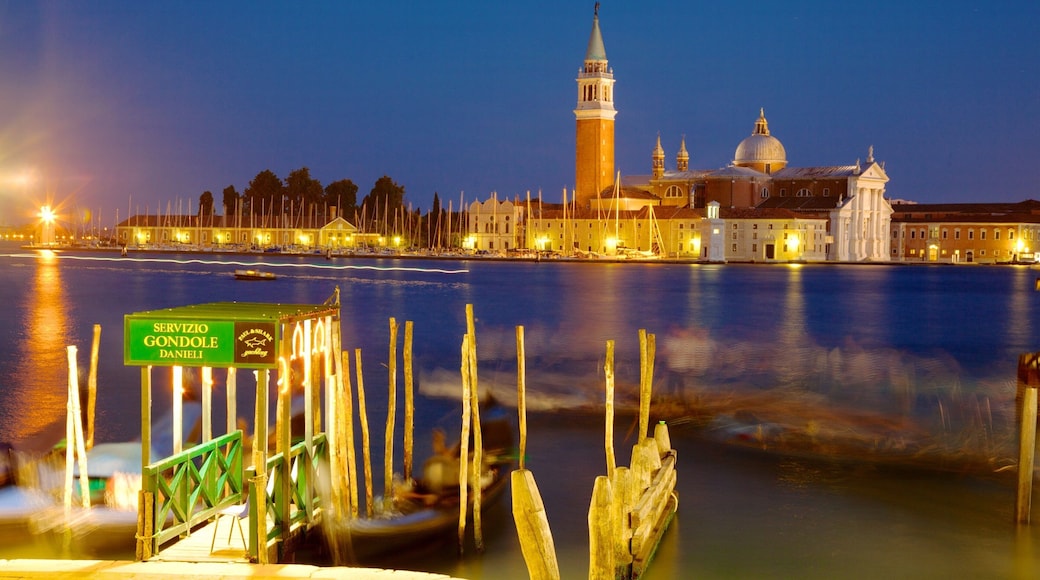 Church of San Giorgio Maggiore showing a bay or harbor, a church or cathedral and religious elements