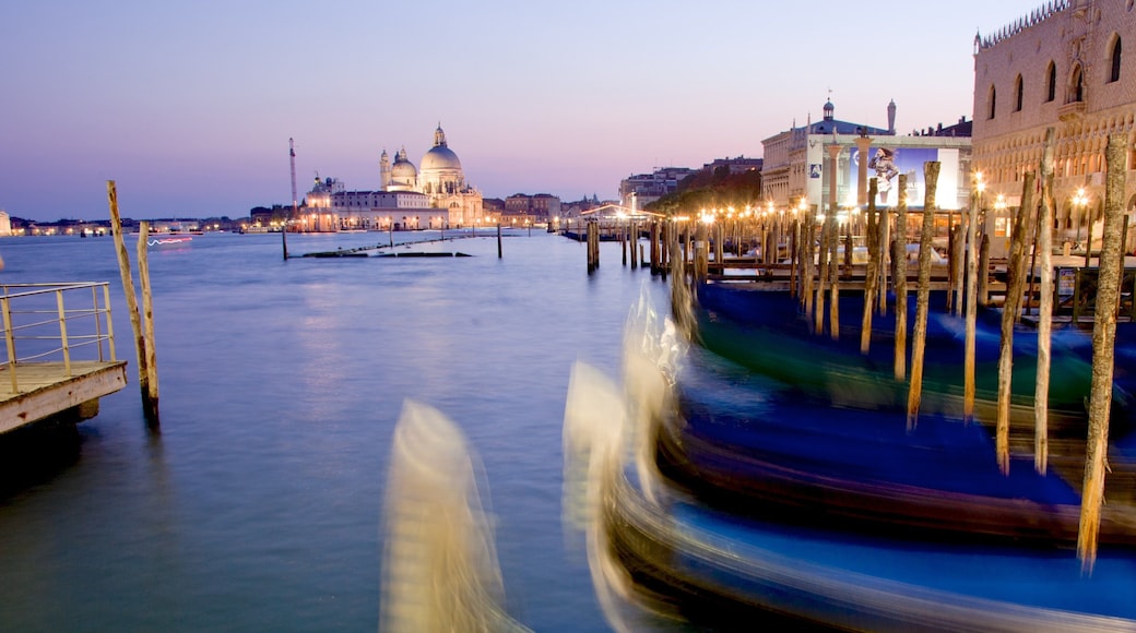 Basilica di Santa Maria della Salute which includes a marina and religious aspects