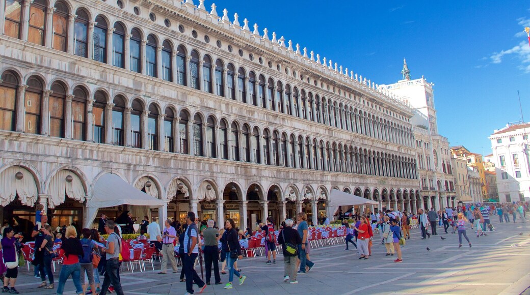 Procuratie Nuove featuring heritage architecture and a square or plaza as well as a large group of people