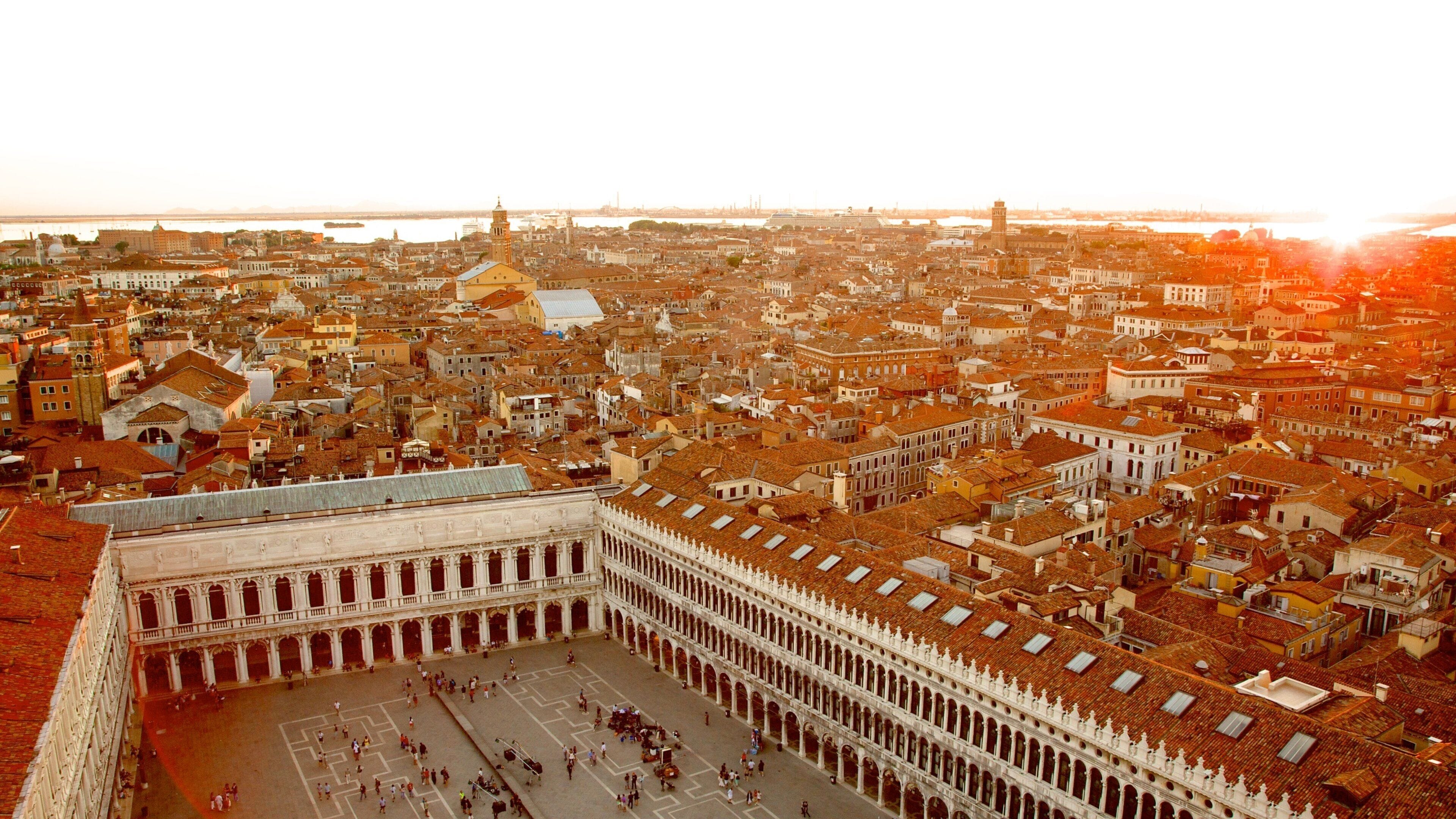 St Mark\'s Campanile showing a square or plaza, a coastal town and heritage architecture