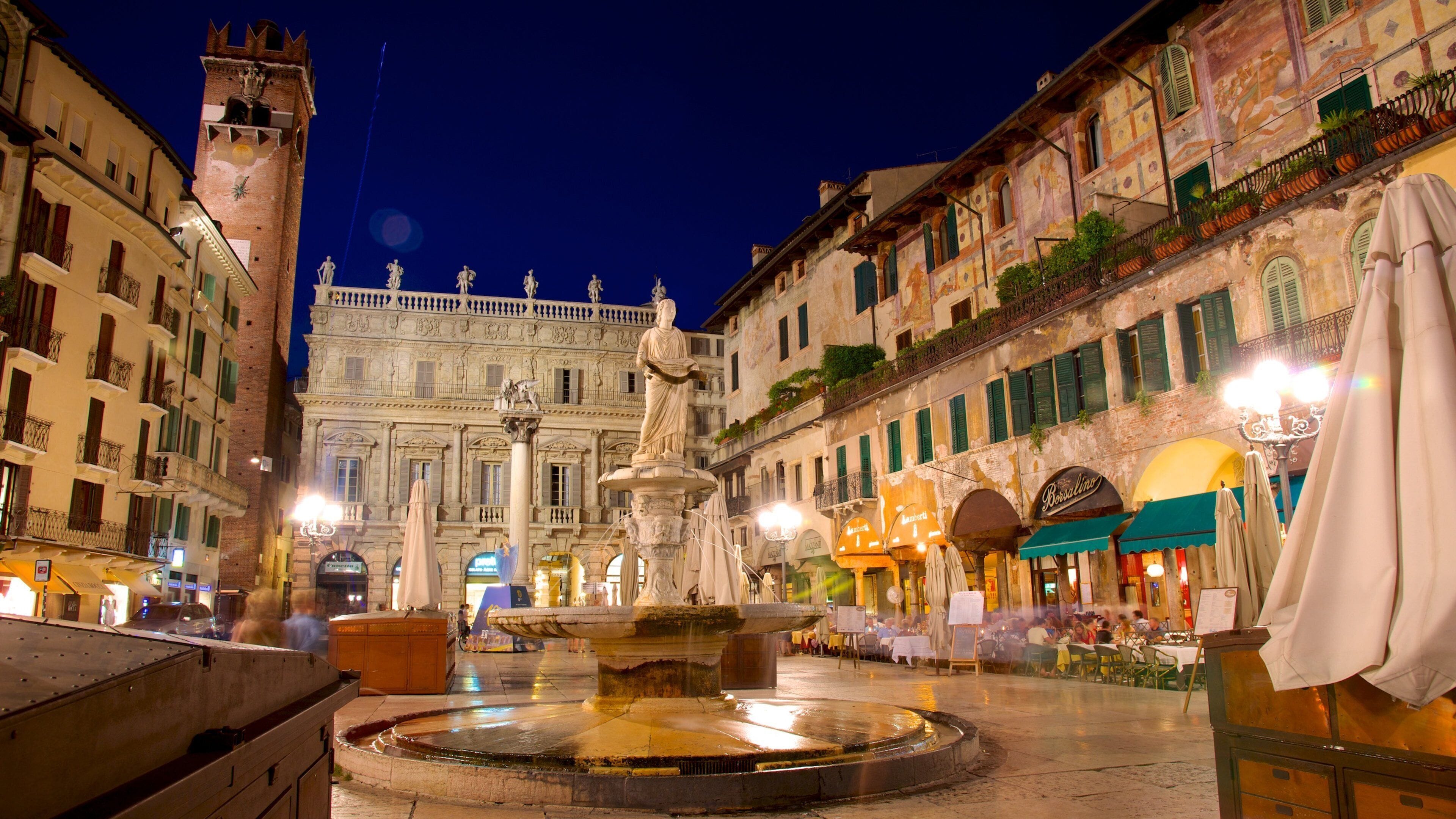 Piazza delle Erbe featuring night scenes, a square or plaza and art