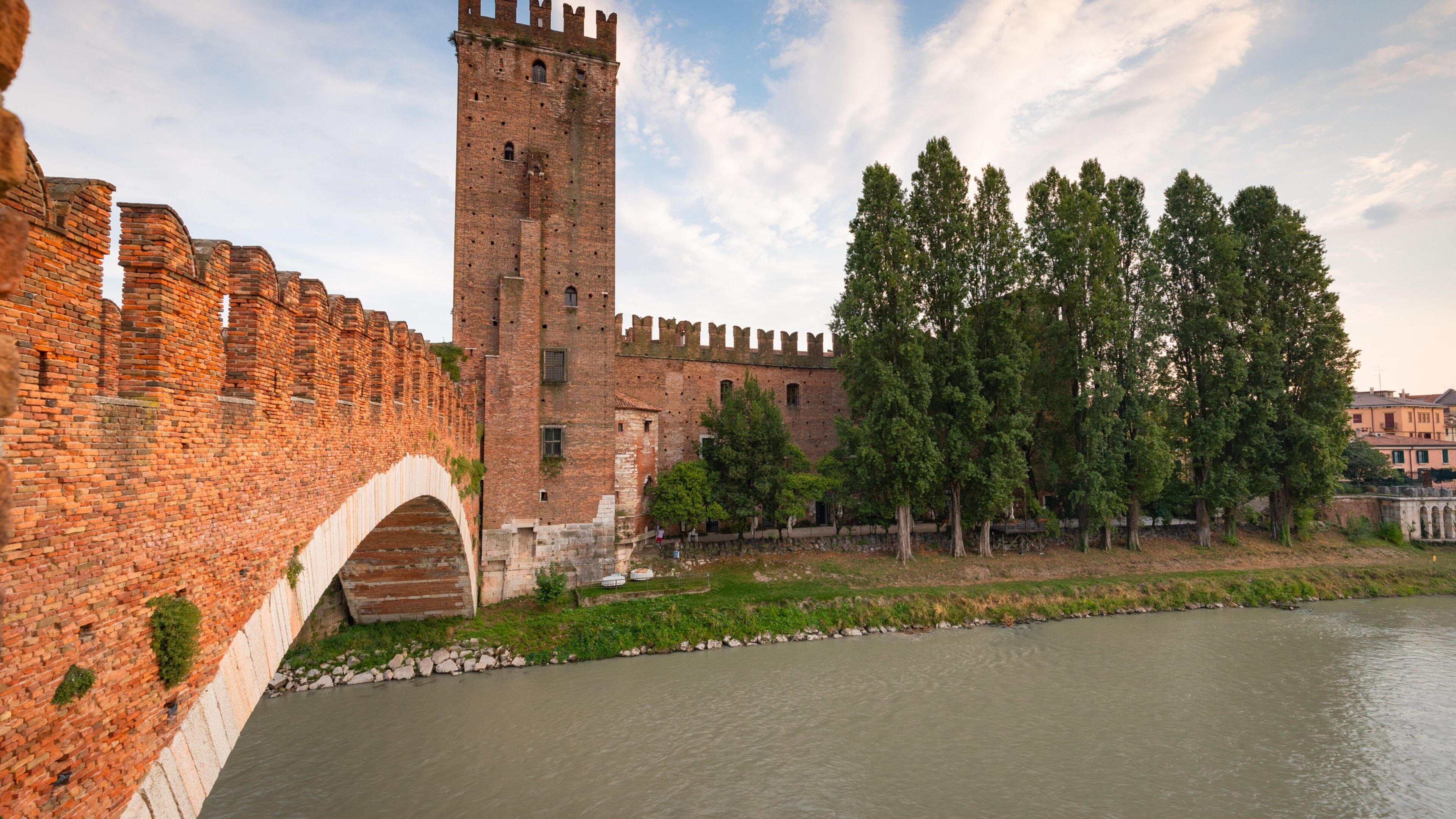 Ponte Scaligero featuring a river or creek, a bridge and heritage elements