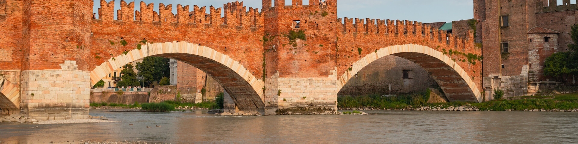 Ponte Scaligero showing a bridge, a river or creek and heritage elements
