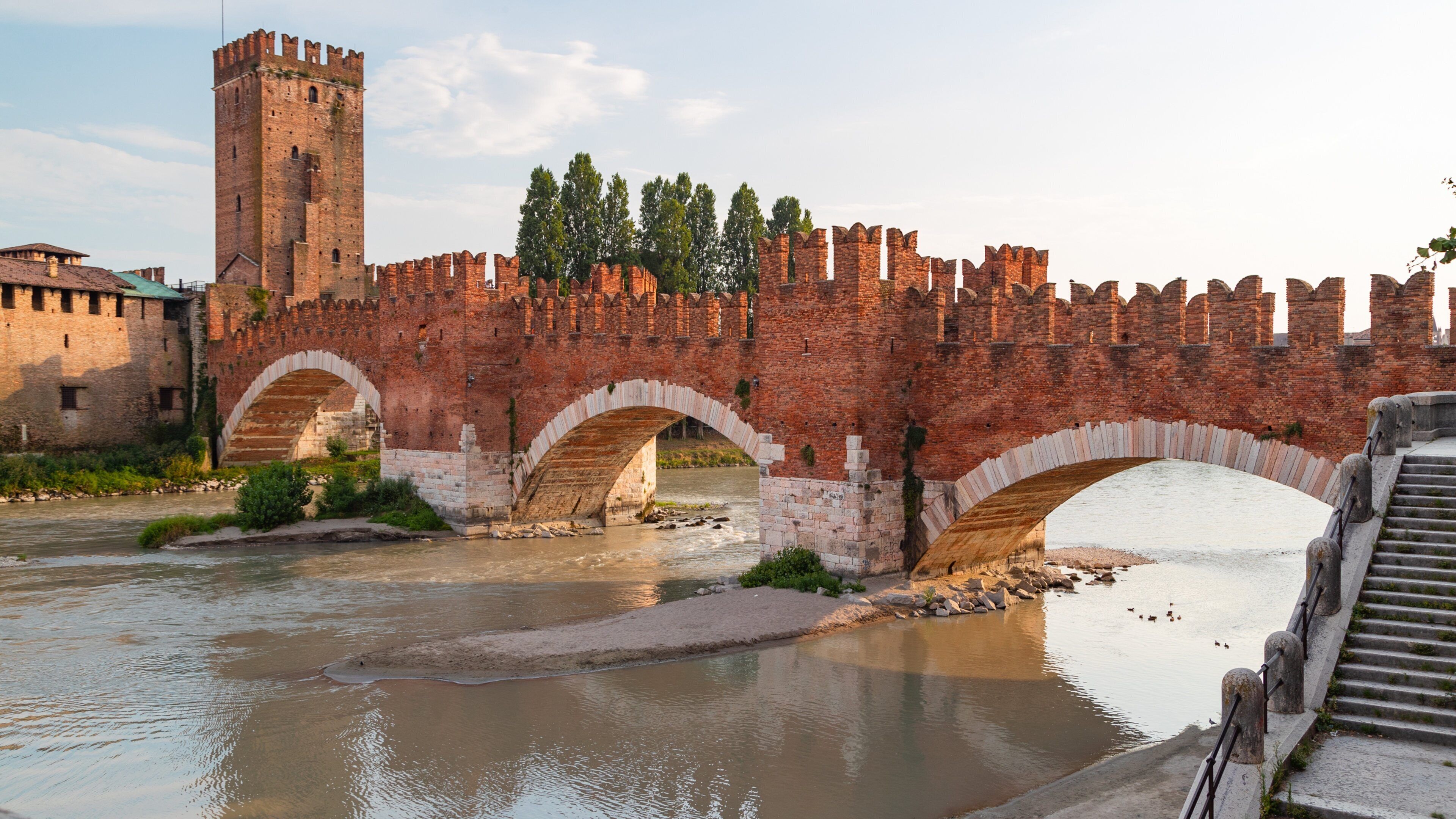 Ponte Scaligero showing a river or creek, heritage elements and a bridge