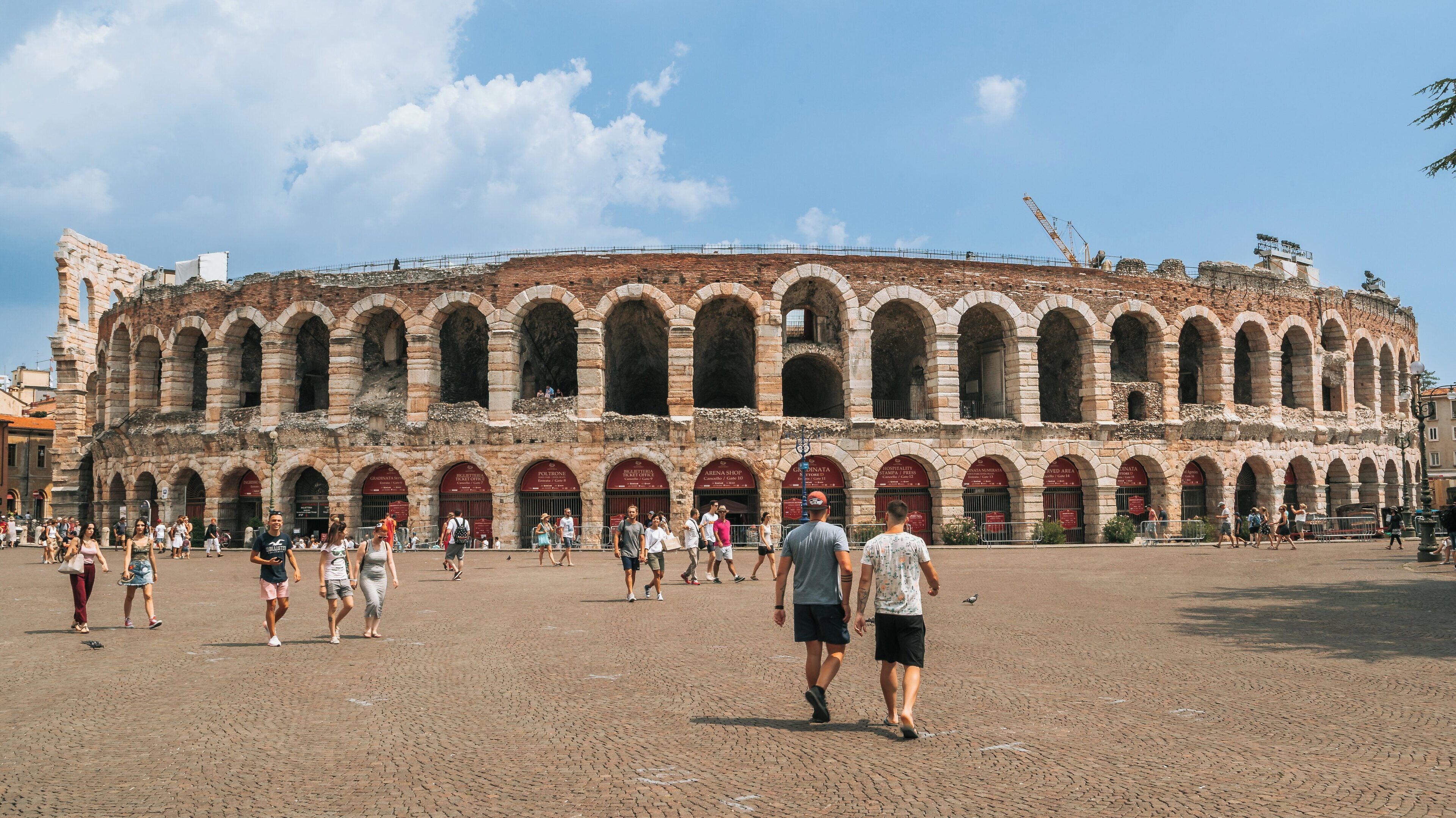 Roman Theater in Verona City Centre is a magnificent ancient structure attracting visitors amid a vibrant atmosphere in Veneto, Italy