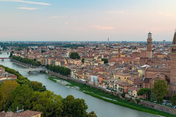 St. Peter\'s Castle featuring a river or creek, a city and a sunset