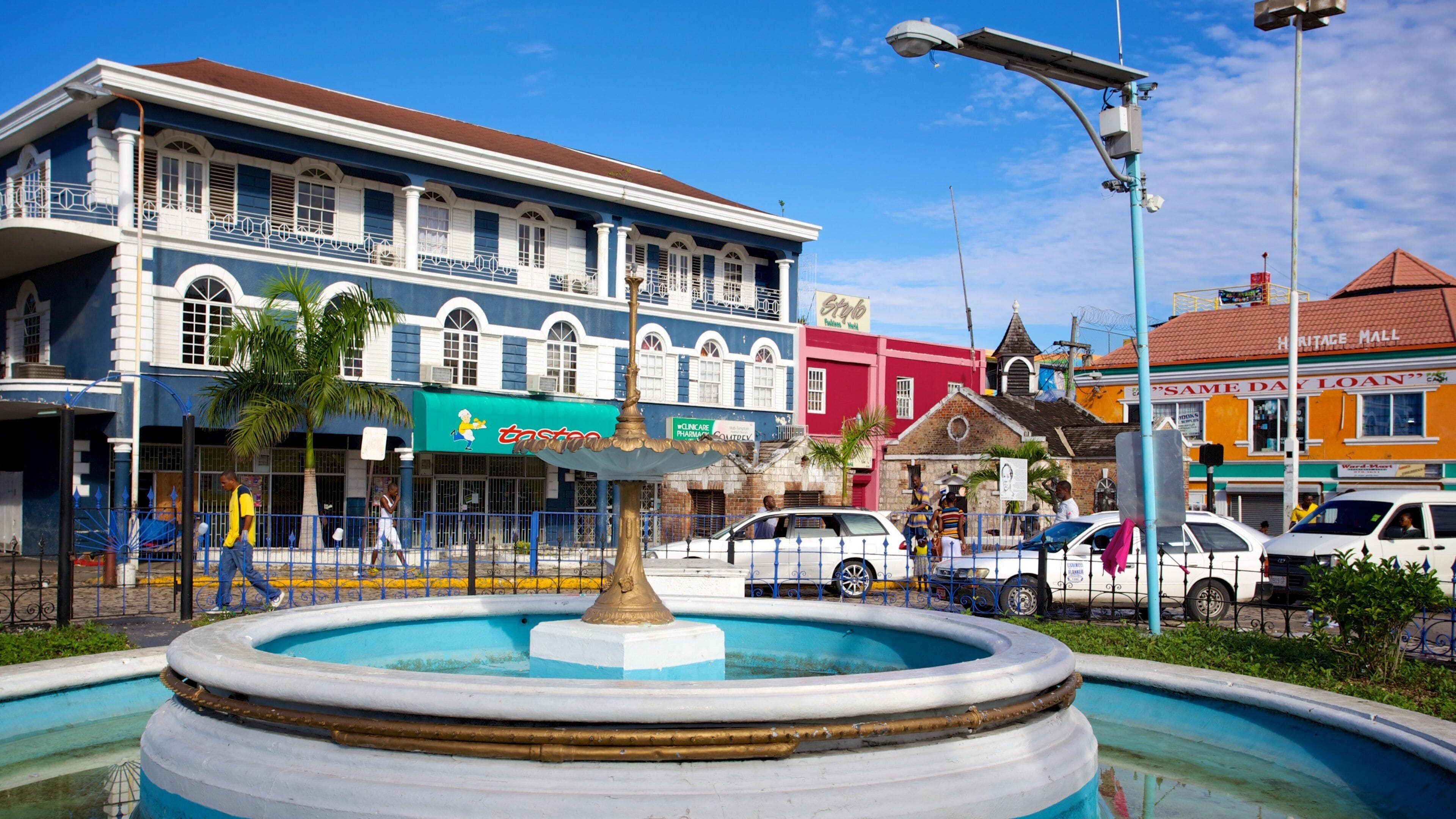 Sam Sharpe Square featuring a fountain, a square or plaza and heritage architecture