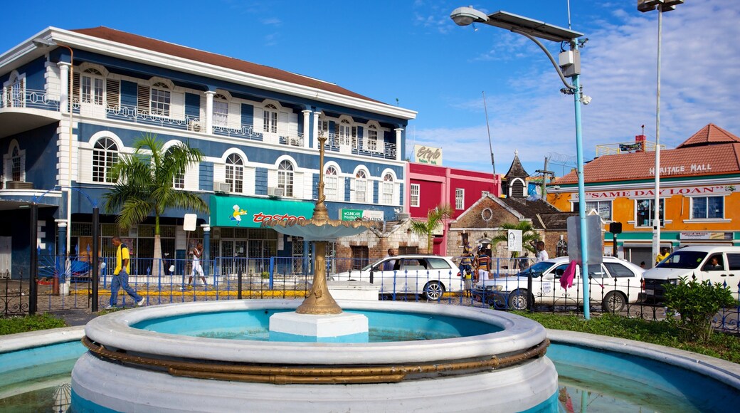 Sam Sharpe Square featuring a fountain, a square or plaza and heritage architecture