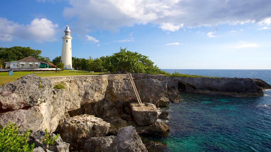 Negril Lighthouse which includes a lighthouse and rugged coastline