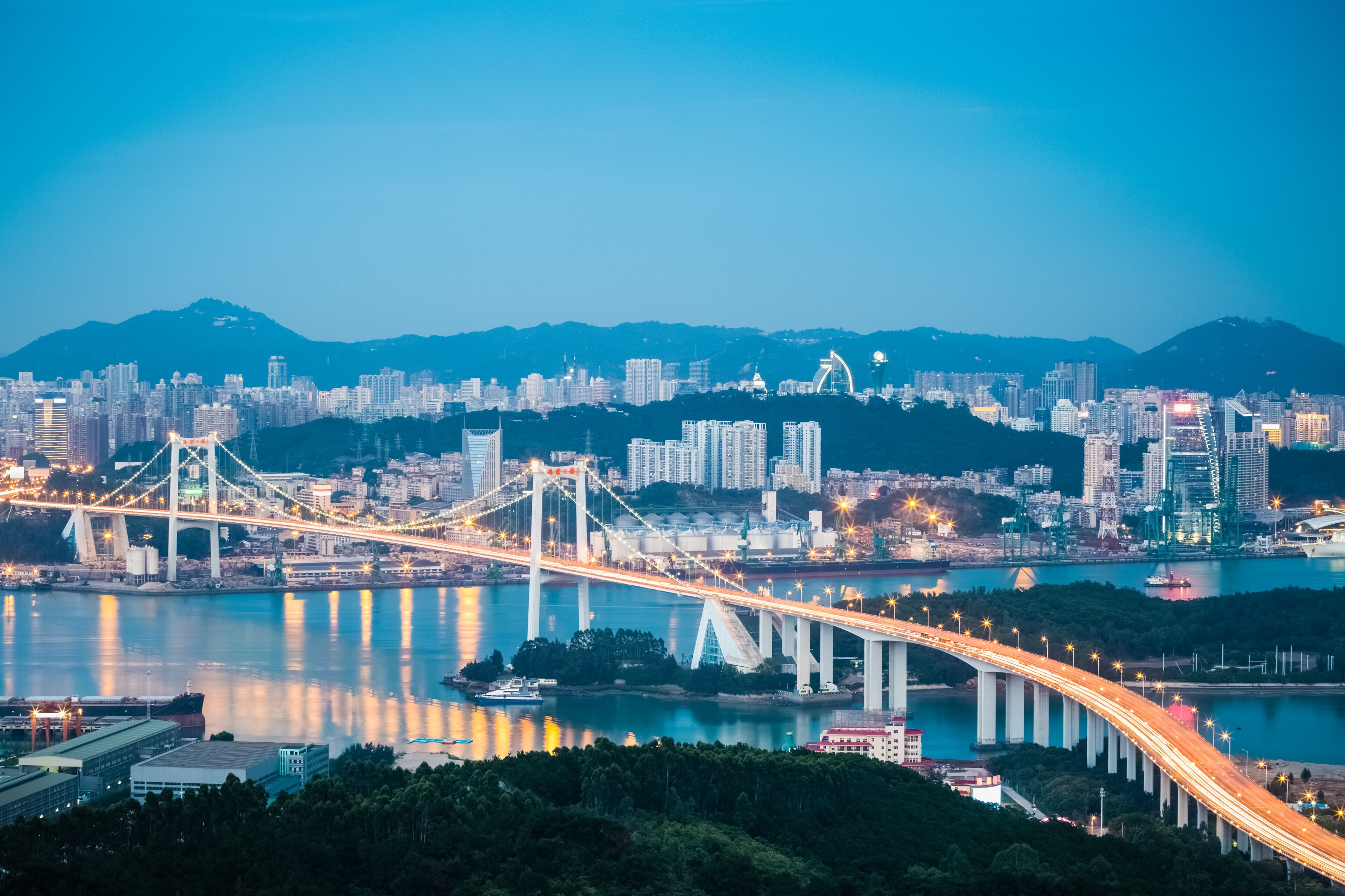 aerial view of xiamen haicang bridge in nightfall