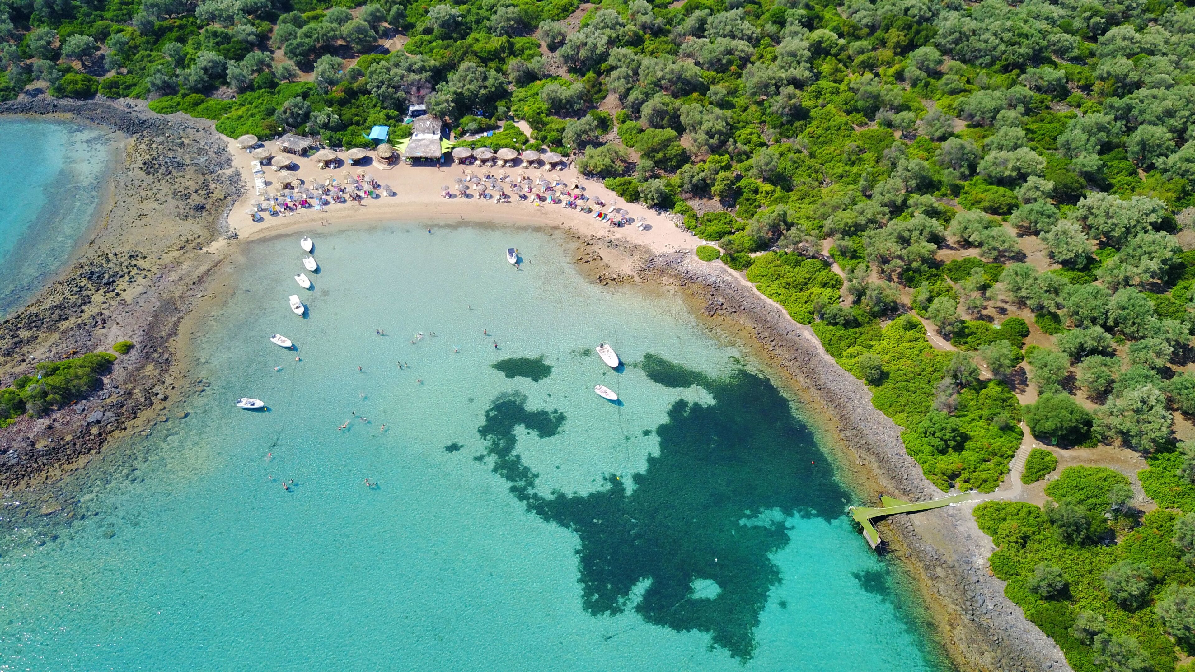 Aerial drone photo of Monolia island exotic beach with sapphire and turquoise clear waters, called the "Seychelles" of Greece, Lihadonisia island complex, North Evoia gulf, Greece