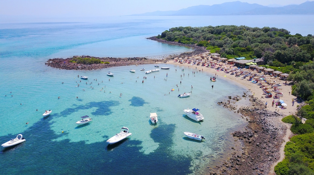 Aerial drone photo of Monolia island exotic beach with sapphire and turquoise clear waters, called the "Seychelles" of Greece, Lihadonisia island complex, North Evoia gulf, Greece