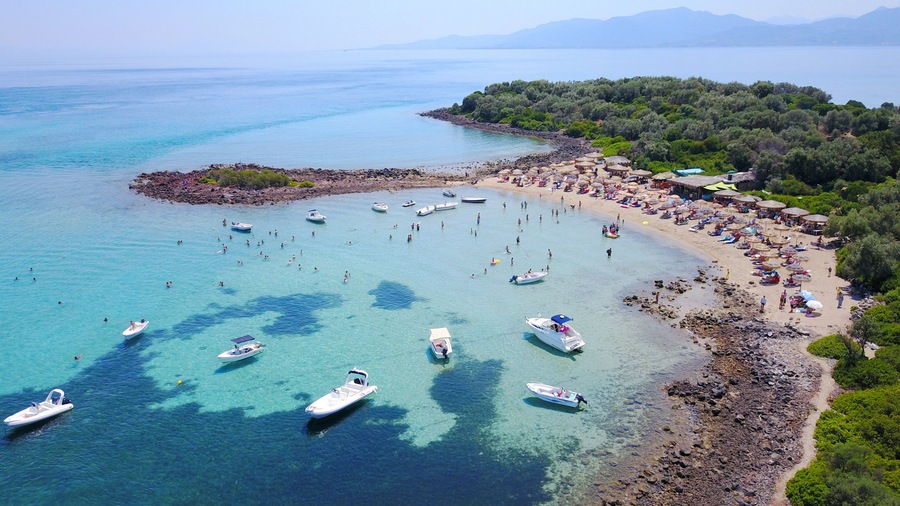 Aerial drone photo of Monolia island exotic beach with sapphire and turquoise clear waters, called the "Seychelles" of Greece, Lihadonisia island complex, North Evoia gulf, Greece