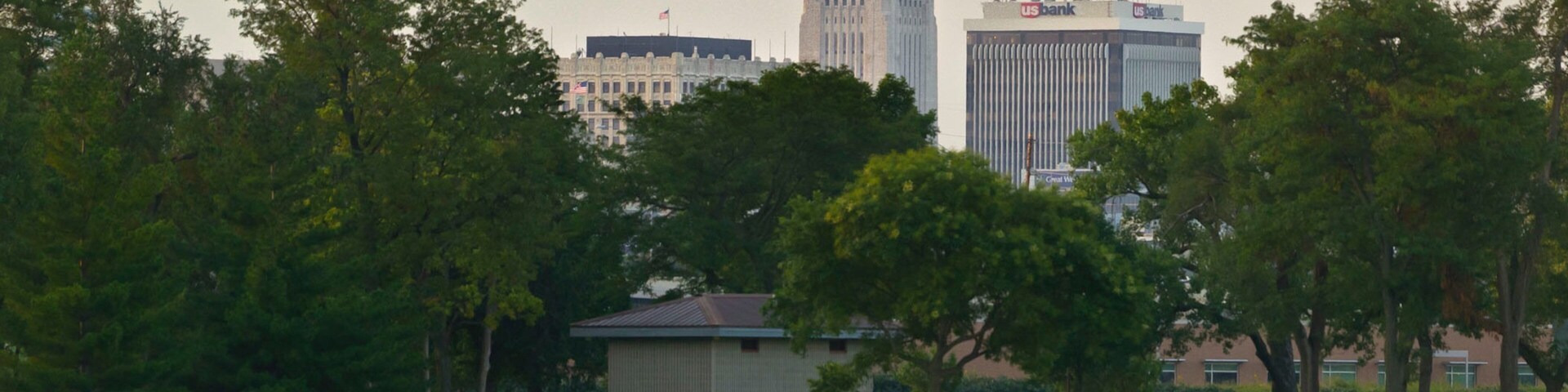 Nebraska State Capitol which includes a river or creek and kayaking or canoeing as well as an individual male