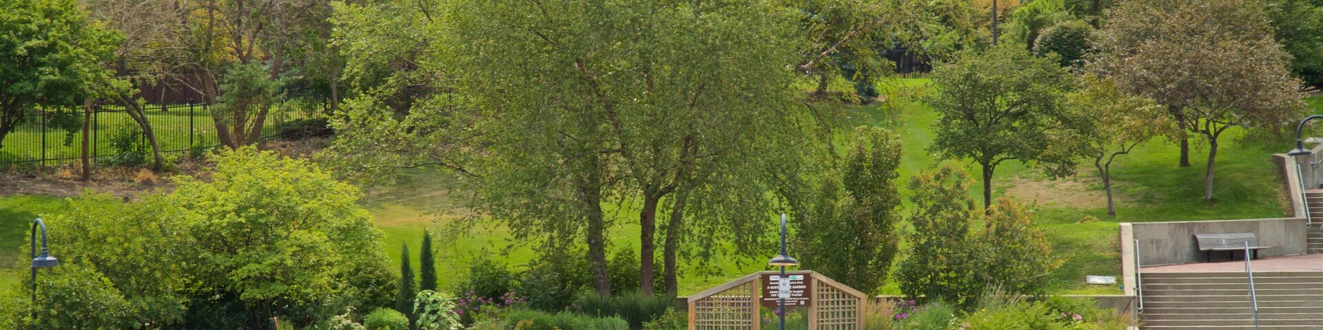 Heartland of America Park which includes a park and a lake or waterhole