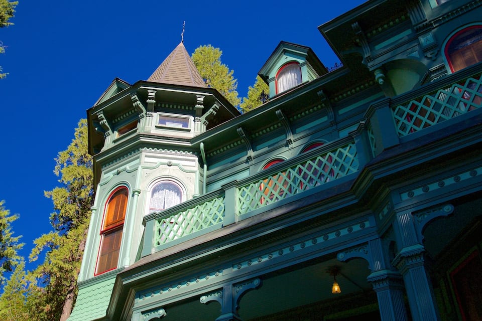 A Victorian-style building with ornate architecture, including a tower and multiple windows.